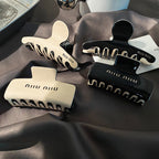 Miu Miu Black White Hair Claw